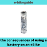 What are the consequences of using a damaged battery on an eBike